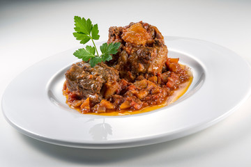 Dish with portion of oxtail stewed