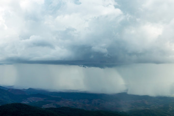 The big rainy day with the clouds in Doi Inthanon national park in Chiang Mai , Thailand in the rainy season. 