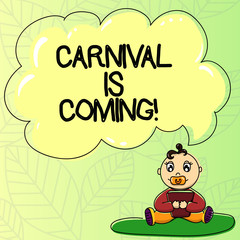 Word writing text Carnival Is Coming. Business concept for public festival which showing play music and dance Baby Sitting on Rug with Pacifier Book and Blank Color Cloud Speech Bubble