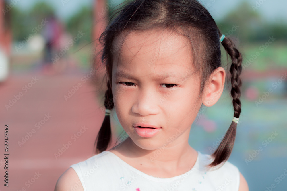 Wall mural child in park. little gril happy at thai