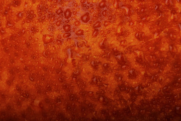 fresh red orange rind with water drops background