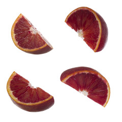 set of slices of red oranges isolated on white background