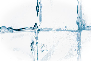 Crystal clear ice cubes against white background.