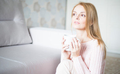 portrait of a woman with cup of coffee
