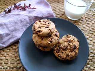 cookies on a plate and glass of milk 