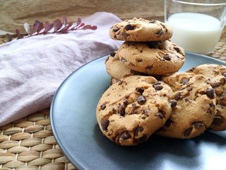 Heap of cookies and glass of milk 