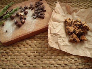 Crushed cookies in a paper with ingredients