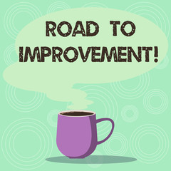 Handwriting text Road To Improvement. Concept meaning way that thing makes something better or yourself Mug photo Cup of Hot Coffee with Blank Color Speech Bubble as Steam icon