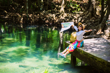 Asian women travel relax, travel nature in the holiday. women enjoying Sitting and watching the...