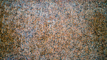 The texture of the red granite of different types. Background.