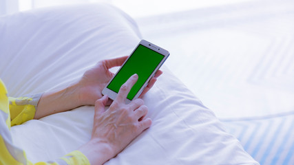 girl with mobile phone in the room