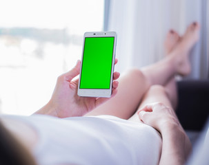 man holding digital phone