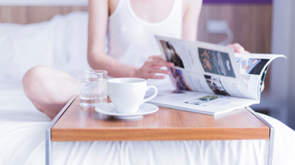 woman working on laptop in cafe
