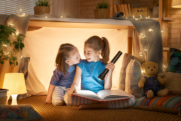 children are reading a book