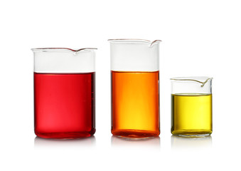 Beakers with color liquid isolated on white. Solution chemistry