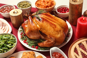 Traditional festive dinner with delicious roasted turkey served on table