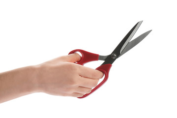 Woman holding scissors on white background, closeup