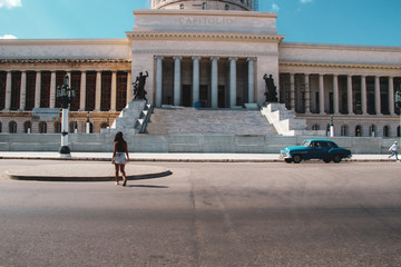 Colorful street and old car in Havana, Cuba