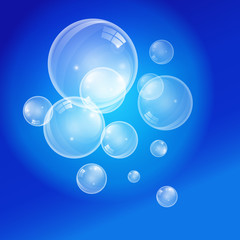 Transparent vector bubbles on blue background