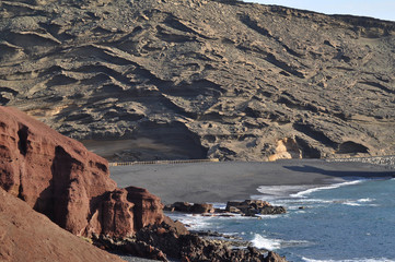 Beautiful black sandy beach in El Golfo, Lanzarote, Canary Islands, Spain