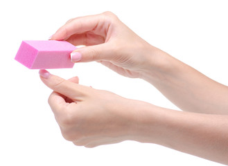 Female hand manicure nail buff on white background isolation