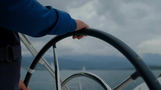 Group of  yacht Sailing regatta in the wind through the waves in Montenegro