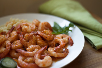 Ready to eat, cooked prawns with vegetables  on a plate. Healthy food.