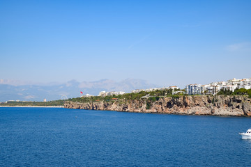 Naklejka na ściany i meble The coastline of Antalya, the landscape of the city of Antalya is a view of the coast and the sea.