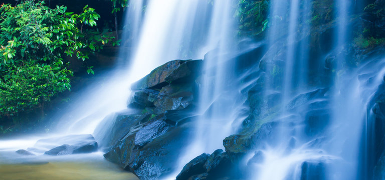 Pure tropical waterfall on summer morning. © Tanes