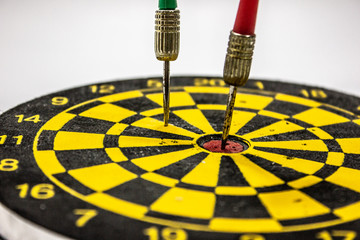 dart hit on center of dartboard. business success concept.