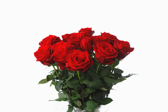 red roses bouquet on white background, fifteen flowers