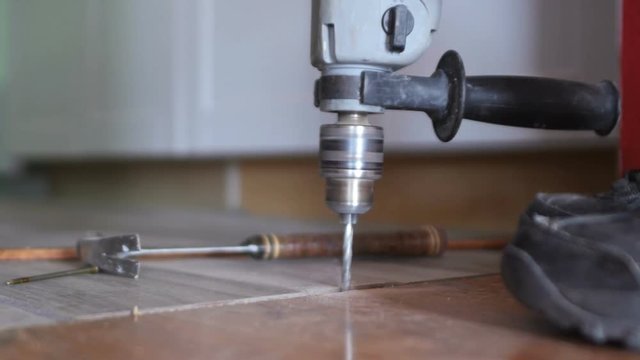 Drilling a hole on a home remodel project