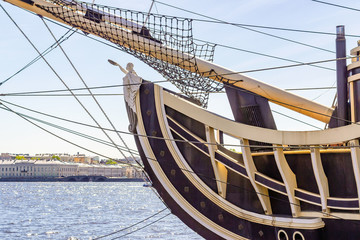 Female figure on the bow of the ship
