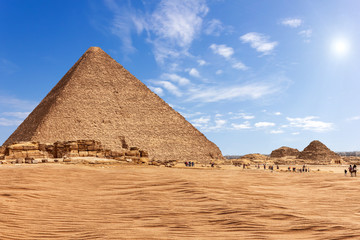 Fototapeta na wymiar The Pyramid of Menkaure in sunny desert of Giza, Egypt