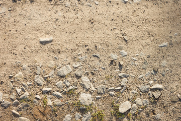 Ground road with fine gravel View from the top. Close-up Background