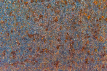 Textural background of rusty steel sheet.
