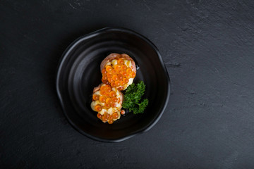 Creative Japanese food.It my neam Salmon Grilled roe ball.Add salmon roe and mayonnaise sauce.Large salmon roe on