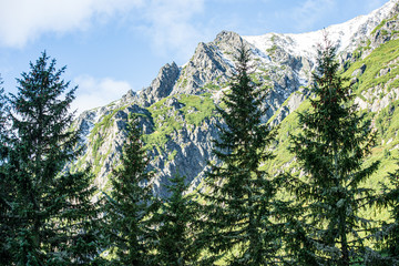 panoramic view of tatra mountains in slovakia in sunny day with blue sky © Martins Vanags