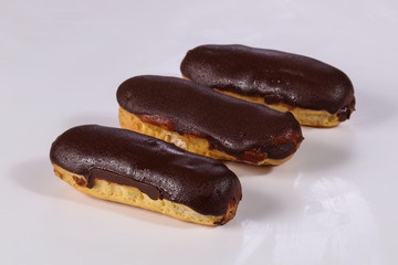 Tasty eclair with cream