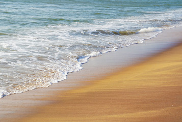 Sunny sandy coast on the ocean on the southern tropical island of Sri Lanka.