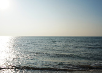 Sunny sandy coast on the ocean on the southern tropical island of Sri Lanka.