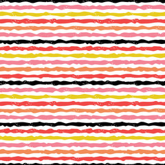 Cute seamless modern stripes background in red, black, yellow and pink on white. Colorful, hand drawn geometric design baby, for birthday, textiles, cards, gift wrapping paper, wallpapers.