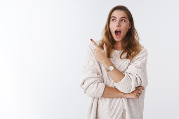 Woman surprised amazed dropping jaw incredible unexpected scene happened. Attractive female...