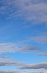 Obraz premium Vertical blue sky and many clouds