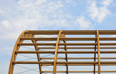 wooden frame of a building under construction