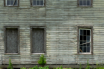 Fototapeta na wymiar Window on old farmhouse