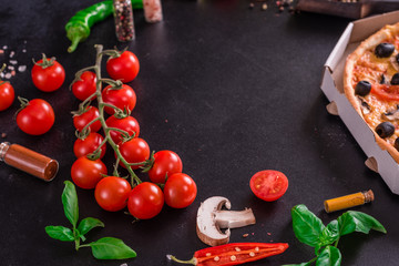 Ingredients for preparation of tasty Italian pizza. Cherry tomato, spices, basil, chili pepper
