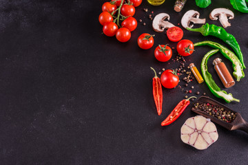 Ingredients for preparation of tasty Italian pizza. Cherry tomato, spices, basil, chili pepper