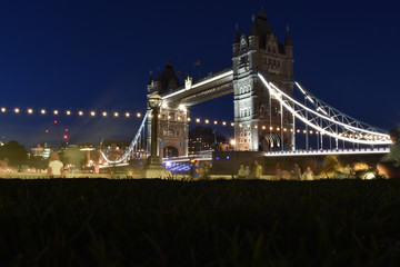 Obraz premium Tower Bridge in London, the UK. Sunset with beautiful clouds. Drawbridge opening. One of English symbols