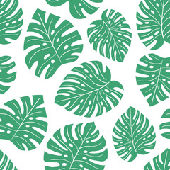 Fototapeta premium Exotic seamless colorful bright pattern with green tropical jungle leaves silhouettes on white background. Floral modern pattern for textile, manufacturing etc. Vector illustration